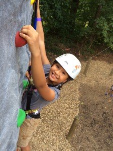 Girl-Climbing-Rock-Wall-225x300